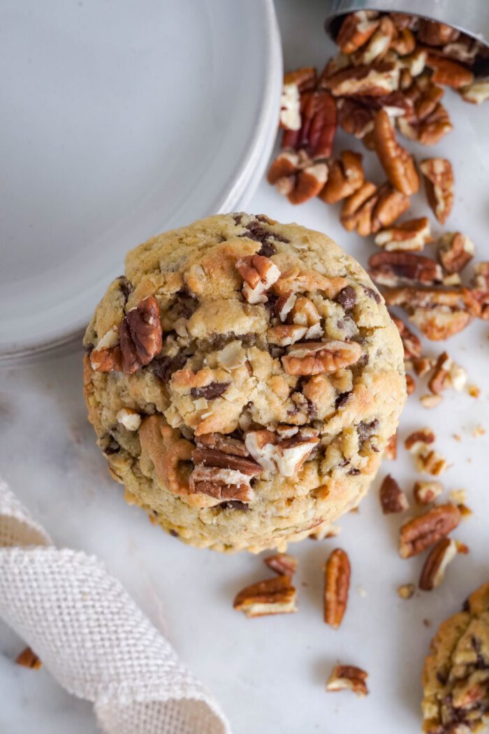 Chocolate Chip Oatmeal Cookie on top of glass of milk