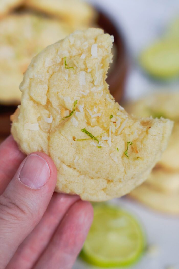 Coconut Lime Sugar Cookie with a bite taken out