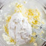 Easy Oreo Cookie Dip adding in marshmallow fluff