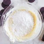 Easy Oreo Cookie Dip mixing in powdered sugar