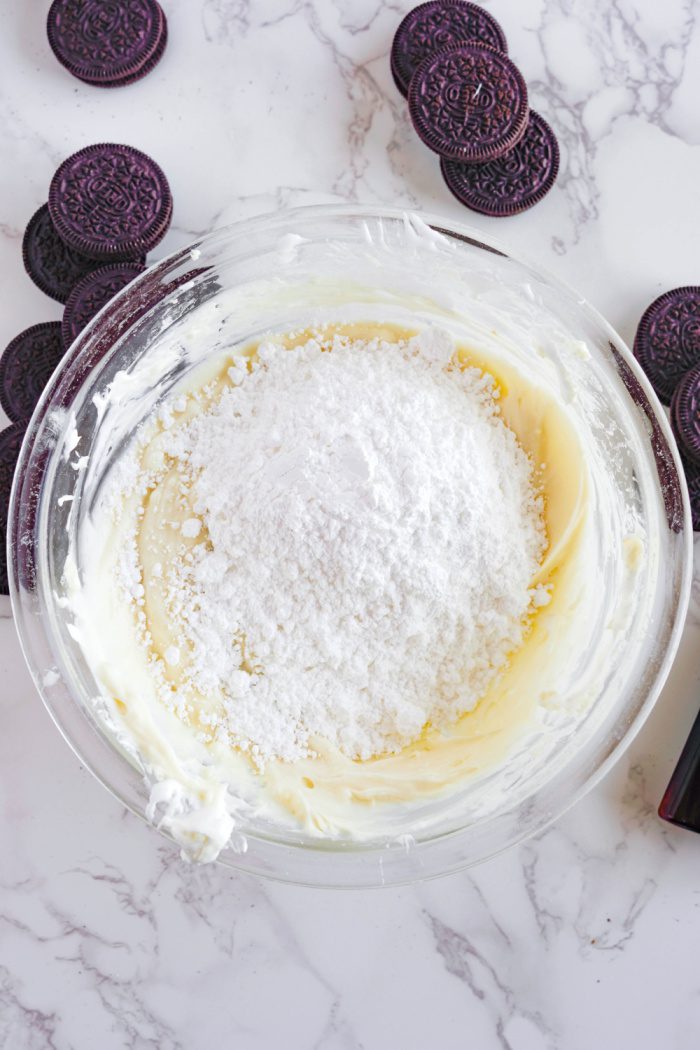 Easy Oreo Cookie Dip mixing in powdered sugar