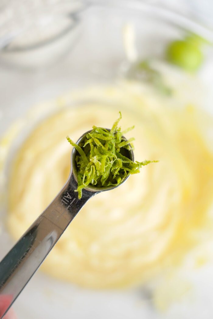 Key Lime Coconut Cookies adding lime zest