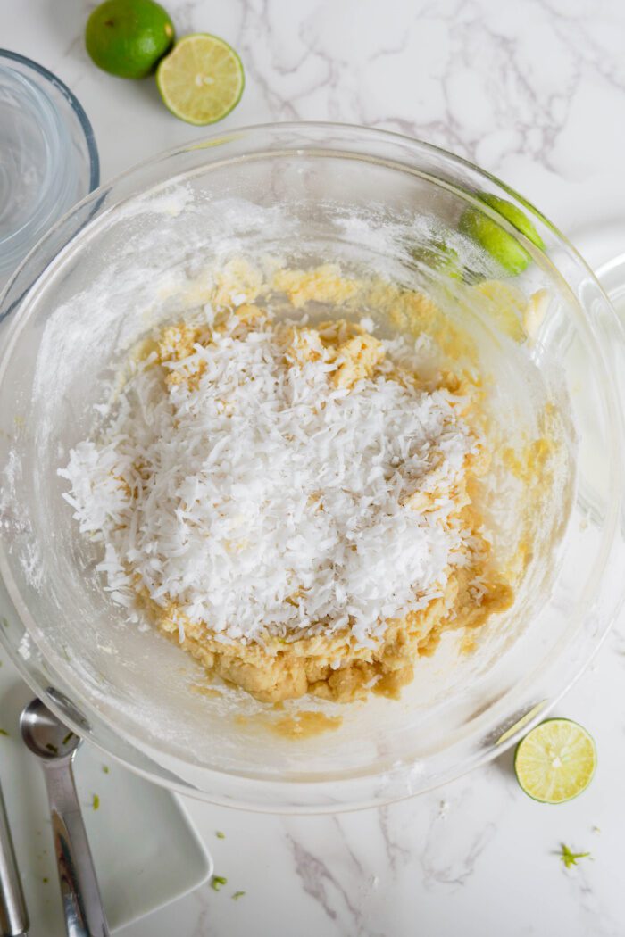 Key Lime Coconut Cookies mixing in dry ingredients