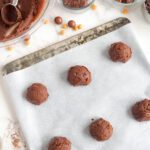 Candy Bar Brownie Cookies dough balls on baking sheet