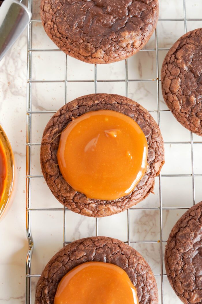 Candy Bar Brownie Cookies glazed with caramel