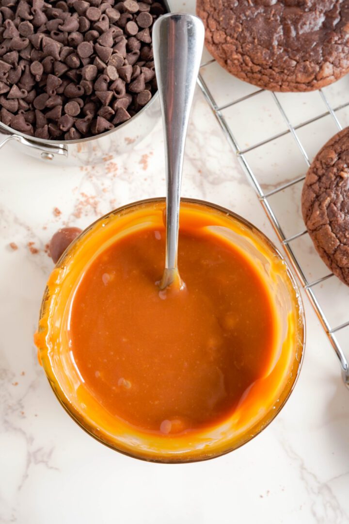 Candy Bar Brownie Cookies melted caramel in a bowl