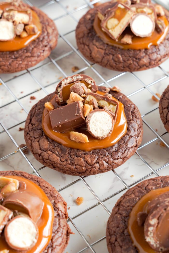 Candy Bar Brownie Cookies topped with chopped candy bars