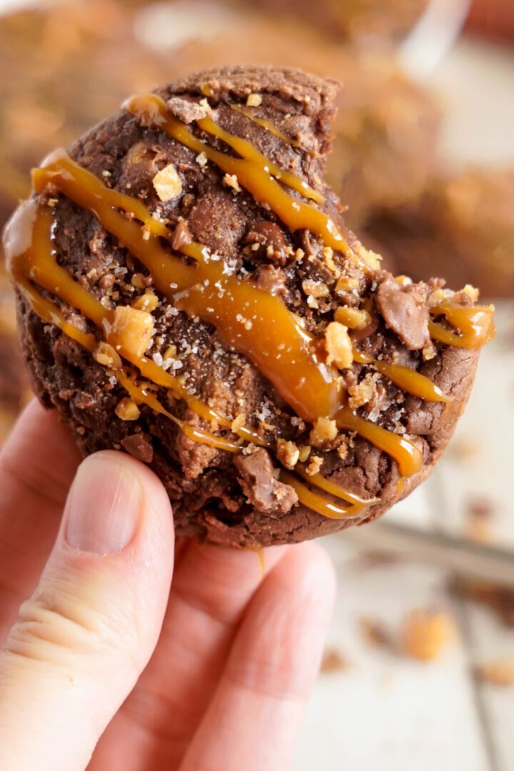 Salted Caramel Brownie Cookie with a bite taken out