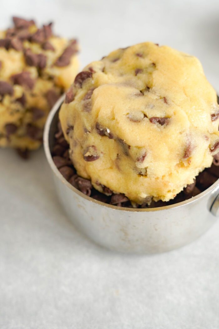Chocolate Chip Cookie dough balls dipped in mini chocolate chips
