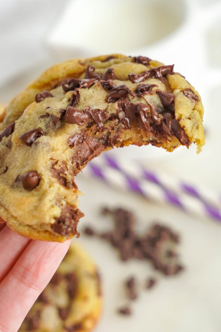 Chocolate Chip Cookie being held in someone's hand