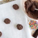 Cosmic Brownies Cookies dough balls on baking sheet
