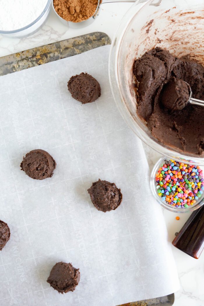 Cosmic Brownies Cookies dough balls on baking sheet