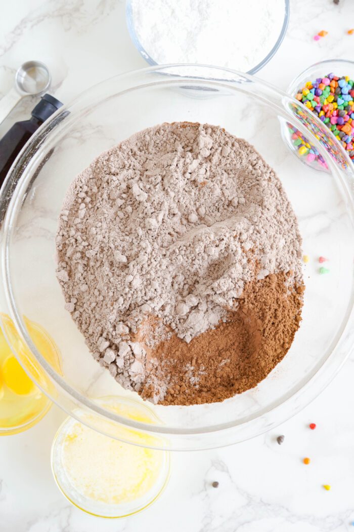 Cosmic Brownies box mix and cocoa powder in bowl