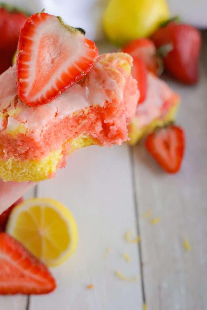 Strawberry Lemonade Bars with bite taken out