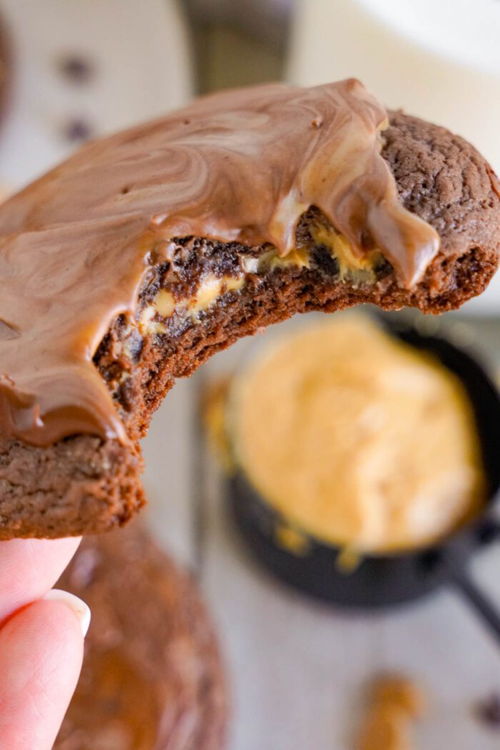 Peanut Butter Brownie Cookies bite out in hand