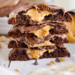 Peanut Butter Brownie Cookies in a stack with gooey center