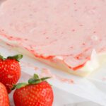 Strawberry Fudge set and taking out of baking dish