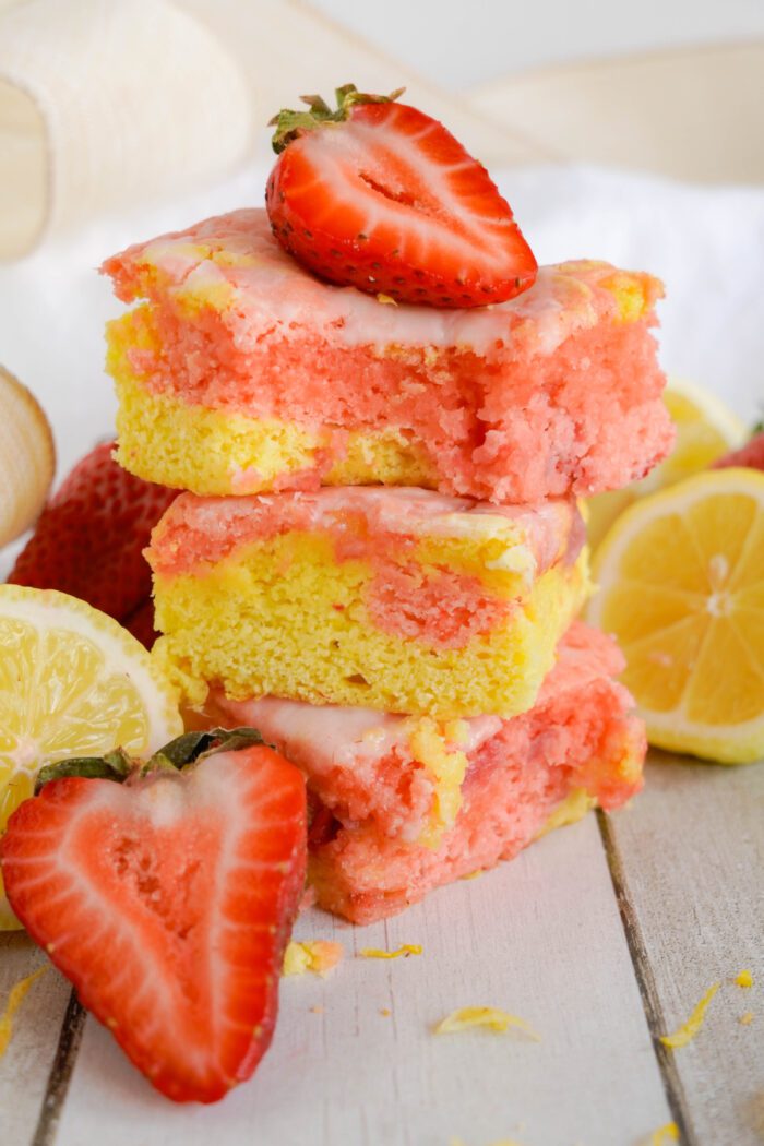 Strawberry Lemonade Brownies stacked on top of each other