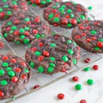 Brownie M&M Christmas Cookies on cooling rack