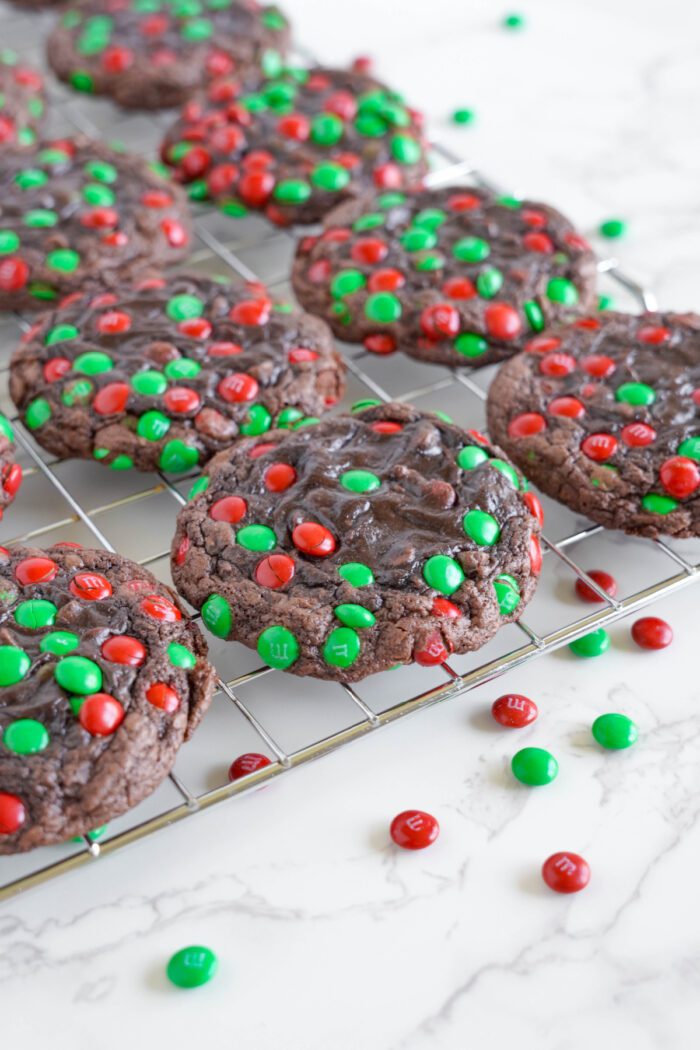 Brownie M&M Christmas Cookies on cooling rack