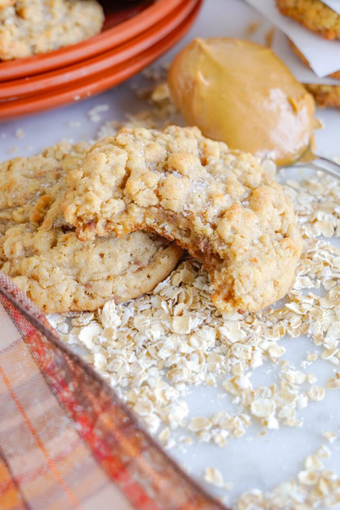 A close-up image of peanut butter cookies with oats.