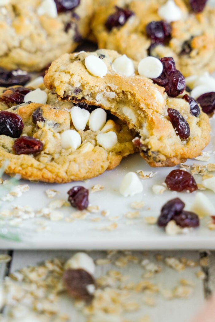 Oatmeal Cranberry Cookies propped up on another cookie