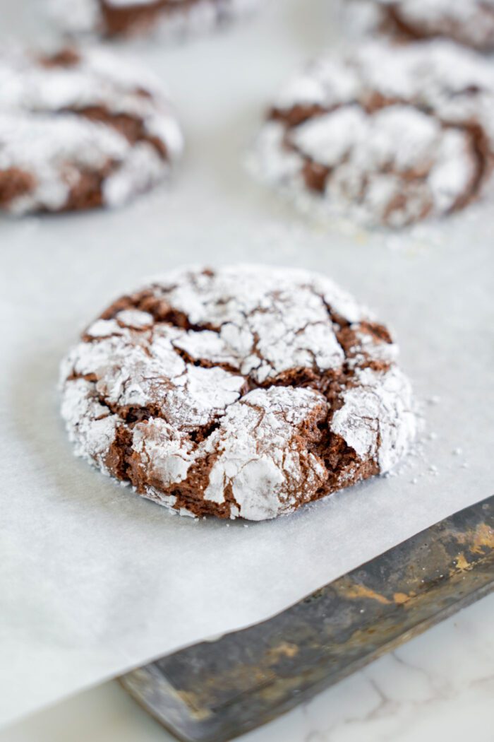 Chocolate Crinkle Cookies baked on baking sheet