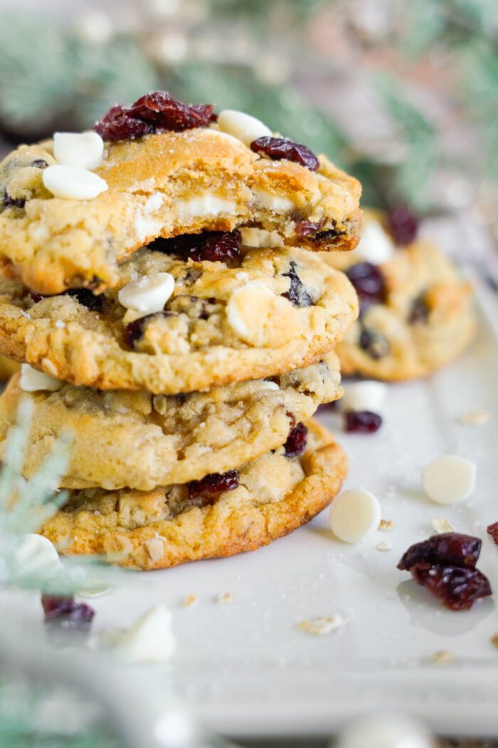 Oatmeal Cranberry Cookies in a stack with a bite taken out
