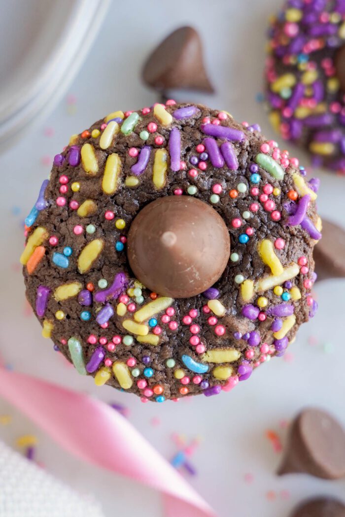 Chocolate donuts with sprinkles and chocolate chips, perfect as easy brownie cookies for Easter.