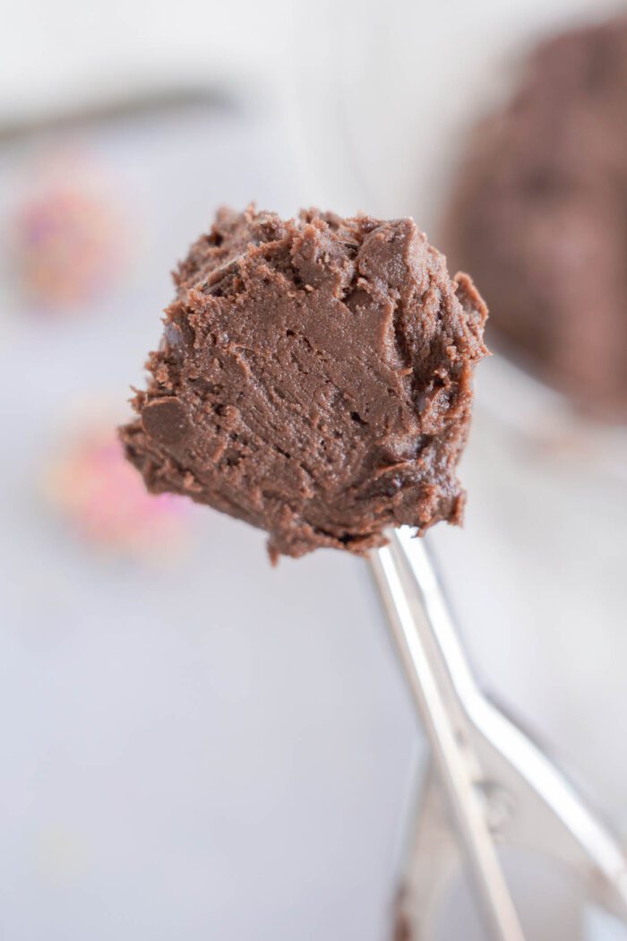 A fork is holding a piece of easy brownie for Easter.