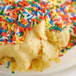 Funfetti Cookies adding sprinkles to cookie dough