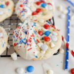 4th of July Cake Mix Cookies on Cooling Rack with Drizzle