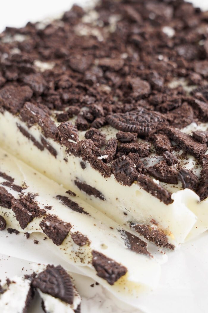 A close-up of Oreo Fudge with crumbled chocolate cookies topping.