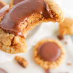 Reese’s Peanut butter Cookies with Bite out in Hand