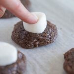 S’mores Brownie Mix Cookies topped with a marshmallow