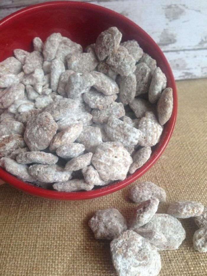 Bowl of Puppy Chow spilling out onto the counter