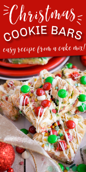 Christmas-themed cookie bars with M&Ms and white drizzle, displayed on a red plate. Text reads: "Christmas Cookie Bars - easy recipe from a cake mix!.