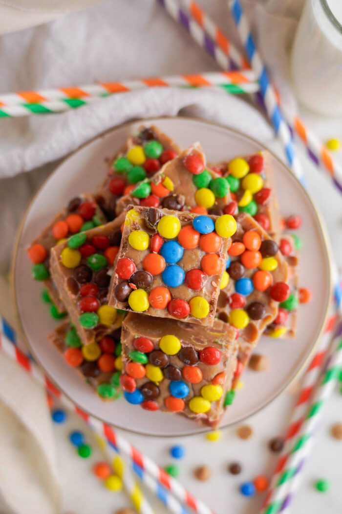 Peanut Butter Fudge squares piled on a plate