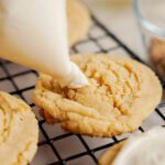 Piping frosting on Cookie Dough Cookies