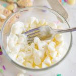 Easter Cake Mix Cookie Bars melting chocolate in bowl