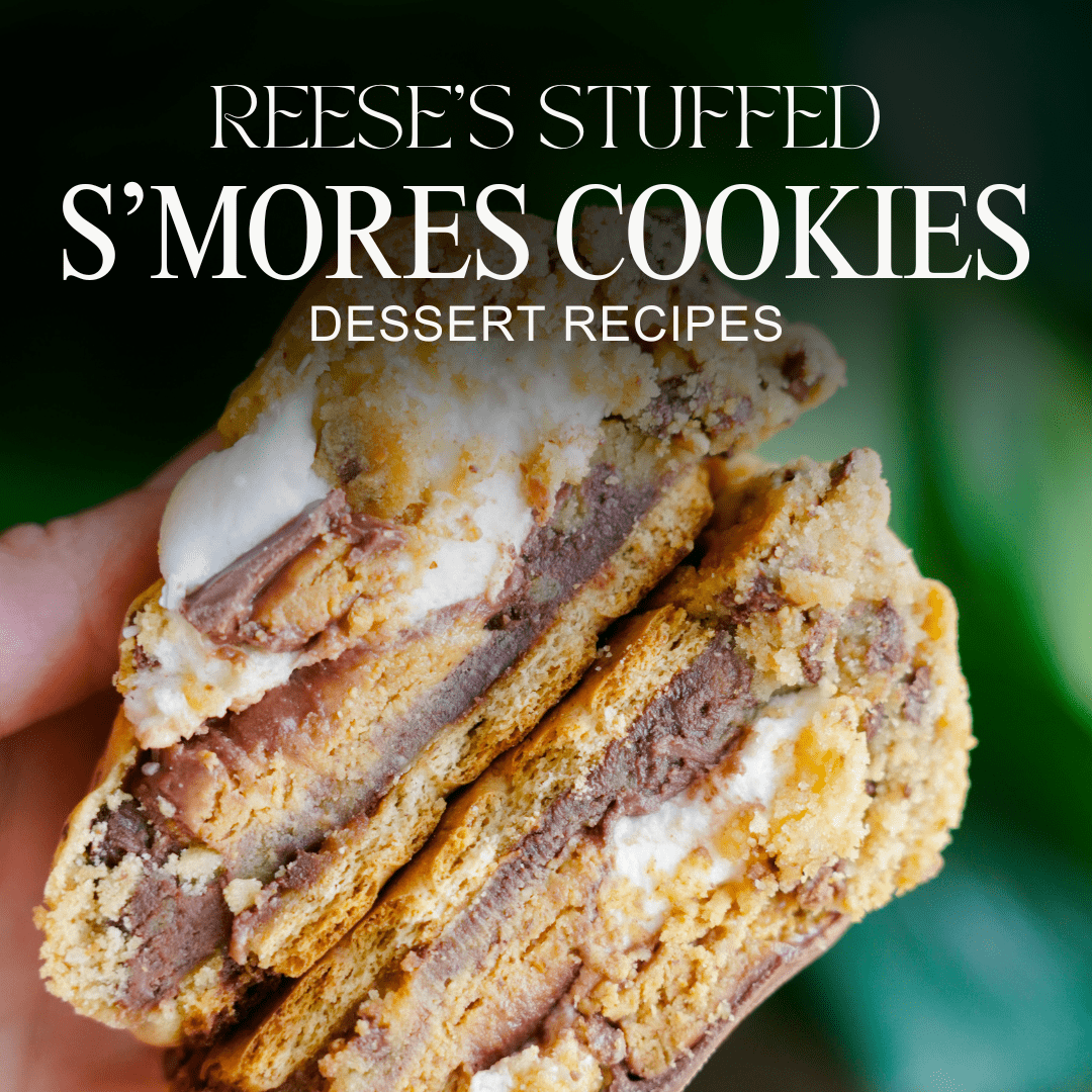 Close-up of a hand holding a Reese's stuffed s'mores cookie. Text overlay reads: "Reese’s Stuffed S’mores Cookies - Gourmet Cookie Recipes.